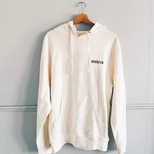SISTERS BY SAFETY PIN > Cream Hoodie